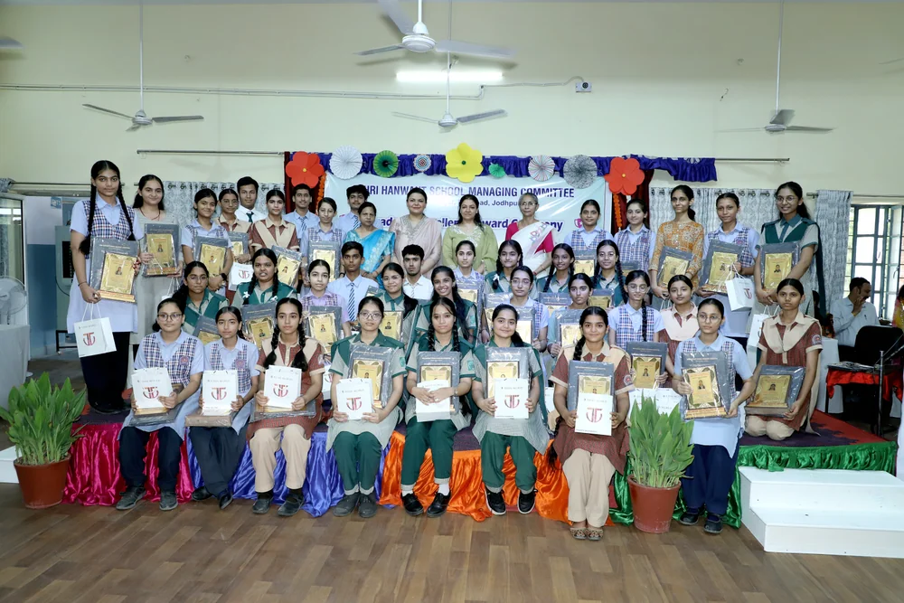 RBSE board achievers group photograph from the HSMC Academic Excellence Award Ceremony 2026