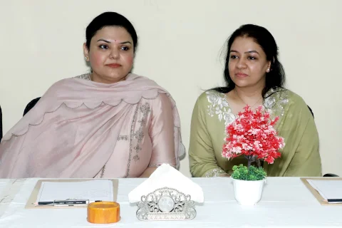 Mrs. Madhuri Singhal and Ms. Prerna Singhal seated at the academic excellence award ceremony