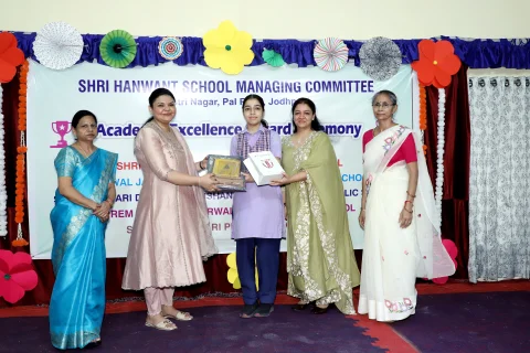 Award presentation on stage during the HSMC prize distribution ceremony