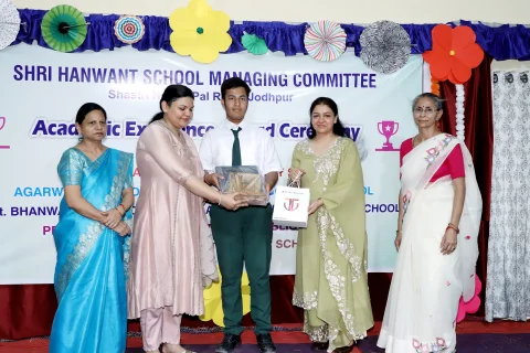 Student receiving an award at the HSMC prize distribution ceremony