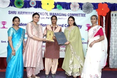Student achiever receiving award during the HSMC Academic Excellence Award Ceremony